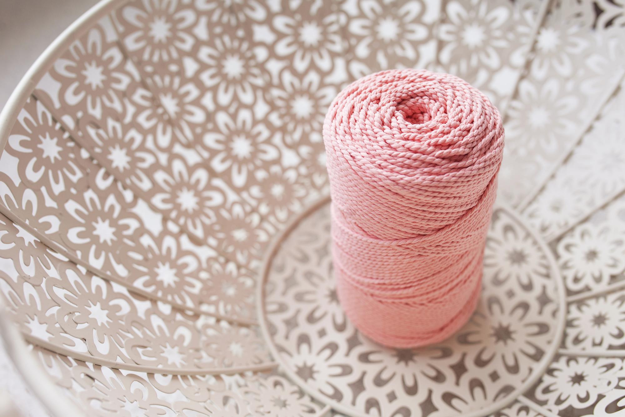 Close-up embroidery thread and needle on linen