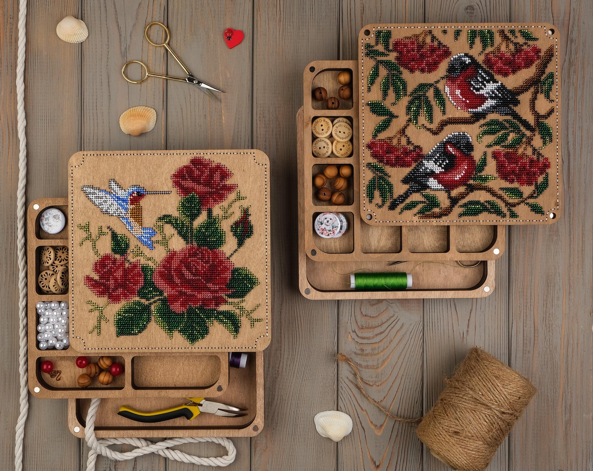 Samples of embroidered swatches on table